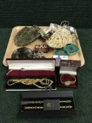 A tray of two brass coats of arms, boxed Rotary wrist watches, gilt chains, cased crowns,
