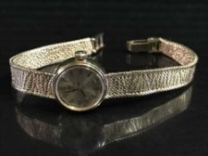 A 9ct gold lady's Omega wrist watch, 16.3g.