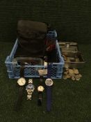 A basket of binoculars, European and Australian coins, costume jewellery, wrist watches,