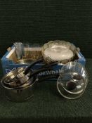 Three boxes of glass ware, pan set, light fittings etc.