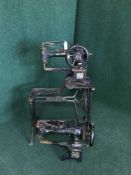 Two early 20th century industrial Singer treadle sewing machines (one on stand)