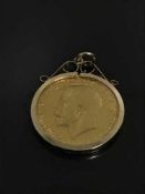 A gold full Sovereign dated 1925, mounted as a pendant in 9ct gold, 9.4g gross.
