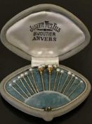 A fine cased set of gold and cultured pearl stick pins,