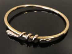 A gold snake bangle, 8.