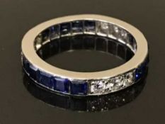 A diamond and sapphire full eternity ring, the sapphires weighing an estimated 1.