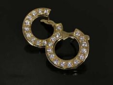 A pair of 18ct gold and diamond set hoop earrings