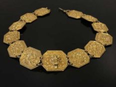 An impressive gold plaque necklace,