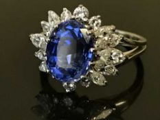 A very fine 18ct white gold diamond and Ceylon sapphire cluster ring,