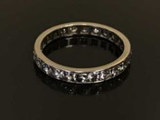 A platinum and diamond set full eternity ring