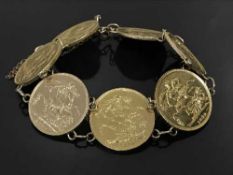A gold full Sovereign bracelet set with seven coins dated 1899, 1900, 1893, 1899, 1899,
