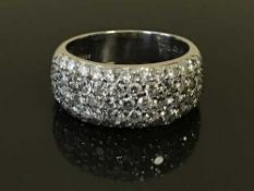 An 18ct gold diamond set ring, the total diamond weight estimated at 1.
