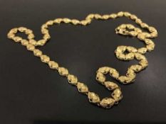 A highly decorative high carat gold chain necklace, stamped 916, 56 cm length, 39.7g.
