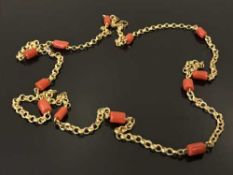 A yellow metal and coral necklace, the clasp stamped 18ct, 16.