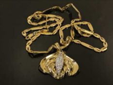 A two-tone textured gold bangle, 64 mm internal diameter, indestinctly stamped, tested as 22ct, 29.