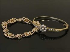 A 15ct gold and seed pearl bangle (8.