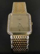 A fine lady's 18ct gold and diamond set Longines wristwatch, quartz movement,