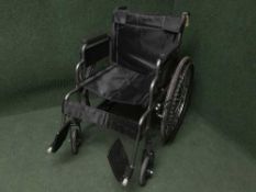 A folding light weight wheel chair
