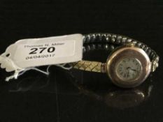 A lady's early 20th century 9ct gold wristwatch, the movement signed Admiralty,
