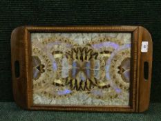 A fine inlaid mahogany butterfly tray