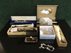 A collection of costume jewellery, collectors spoons,