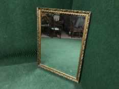A gilt framed mirror