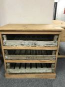 A reclaimed pine three drawer crate chest