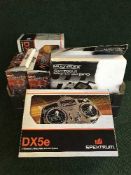A box of five remote controlled units including two Spektrum Dx 5E's,