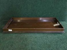 A mahogany twin handled butler's tray