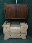 An oak dressing chest together with a mid twentieth century shutter door record cabinet
