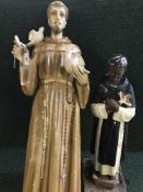 Two plastic religious figures,