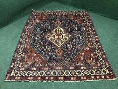An antique Persian Kashgai rug