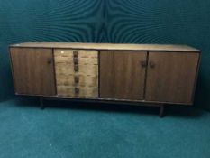 A mid twentieth century teak low sideboard
