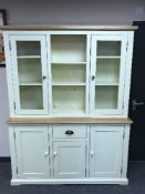 A contemporary oak and cream painted dresser