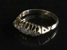An 18ct gold five stone diamond ring, 2.