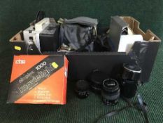 A box of two SLR cameras and lense,