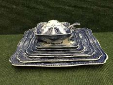 A part antique Burslem dinner set including meat plates and tureens,