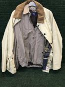 A Barbour cream rain jacket size Large, together with a Ralph Lauren Polo jacket size medium.
