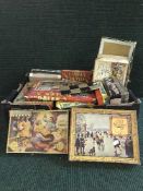 Three boxes of vintage jigsaws, mid twentieth century children's books,