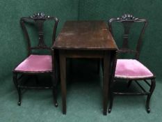 A mahogany drop leaf table and a pair of Edwardian bedroom chairs
