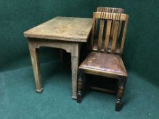An oak turn over top table and pair of oak dining chairs