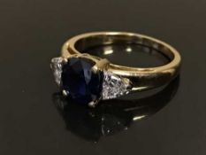 An 18ct gold sapphire and diamond ring,