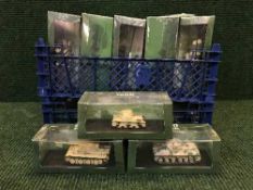 Three baskets of Atlas Ultimate Tank Collection vehicles