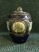 A Royal Doulton Lambeth lidded biscuit barrel