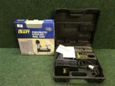 A Power Craft stapler - nail gun together with a Power Craft drill,