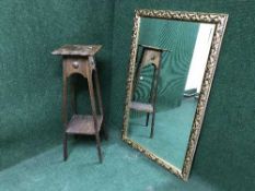 A decorative gilt framed bevelled mirror together with an oak plant stand