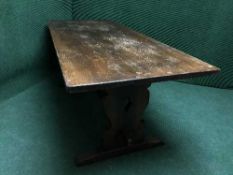 An oak refectory dining table