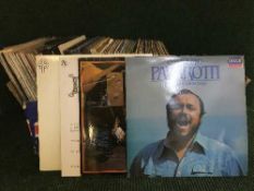 A box of LP records and box sets - Frankie Lane, Pavarotti,
