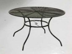 A boxed Montreal circular six seater garden table