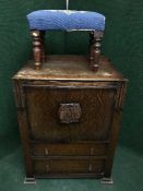 An early twentieth century oak linen chest together with an upholstered stool on mahogany legs