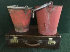 Two metal fire buckets and a vintage luggage case